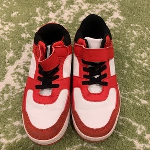 Red and white kid sneaker